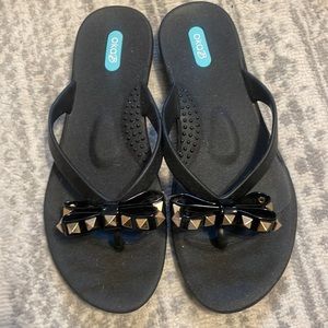 OKA b jelly flip flops